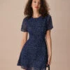 The Navy Crew Neck Polka Dot Cutout Mini Dress
