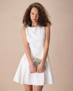 The White Round Neck Pleated Mini Dress